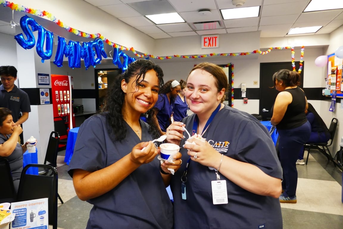 Students and staff enjoying ice cream at the CAHE summer kickoff social